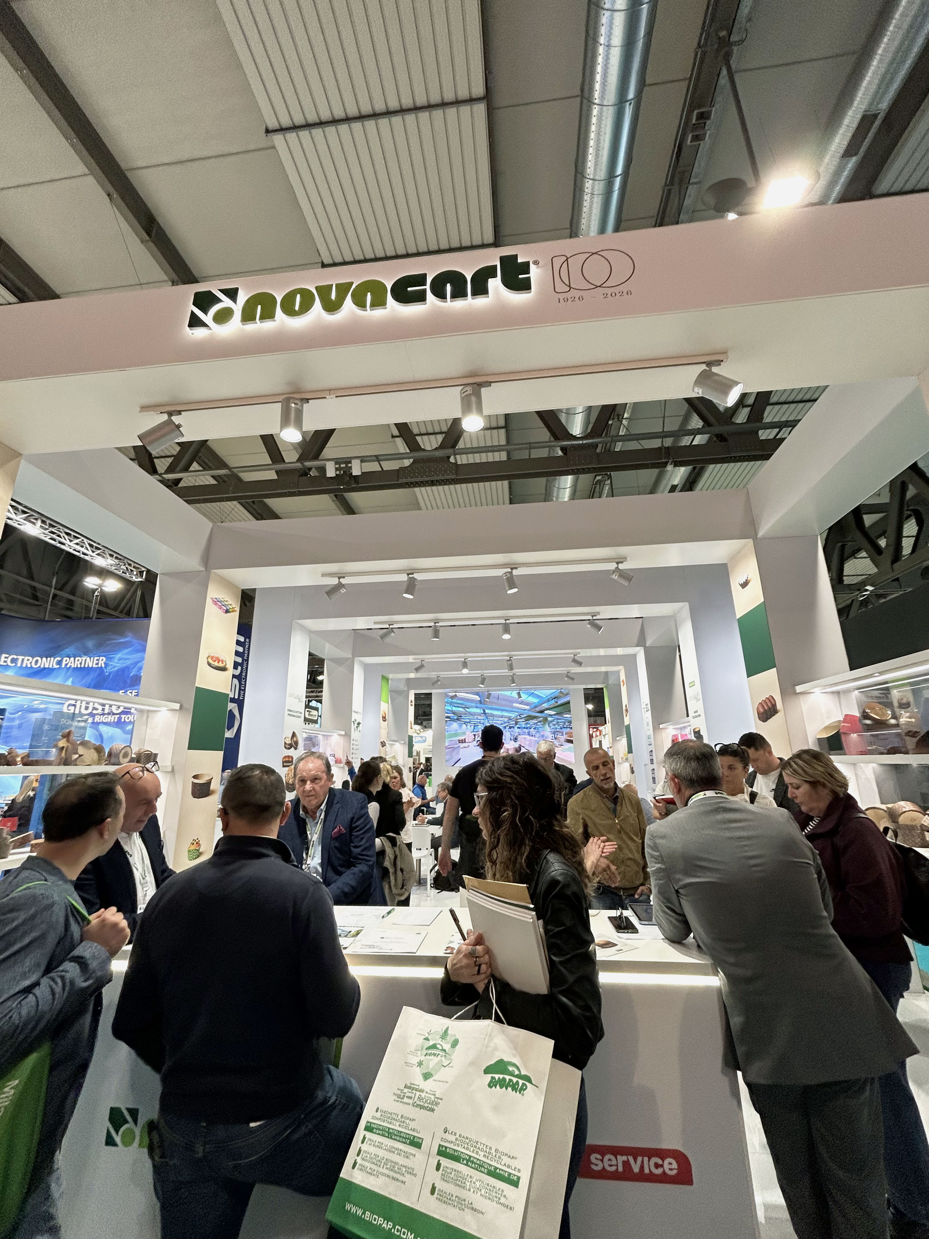 Crowded Novacart stand at Host